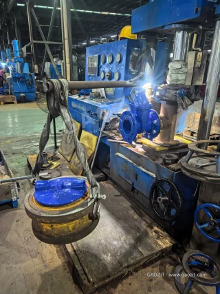 Lever and suspended-load arrangement at the valve test bench.